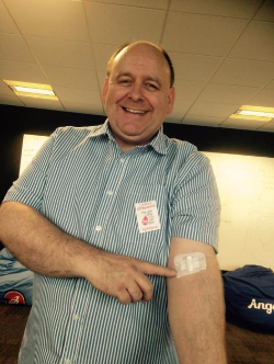 Alan back from the blood bank, and still smiling!